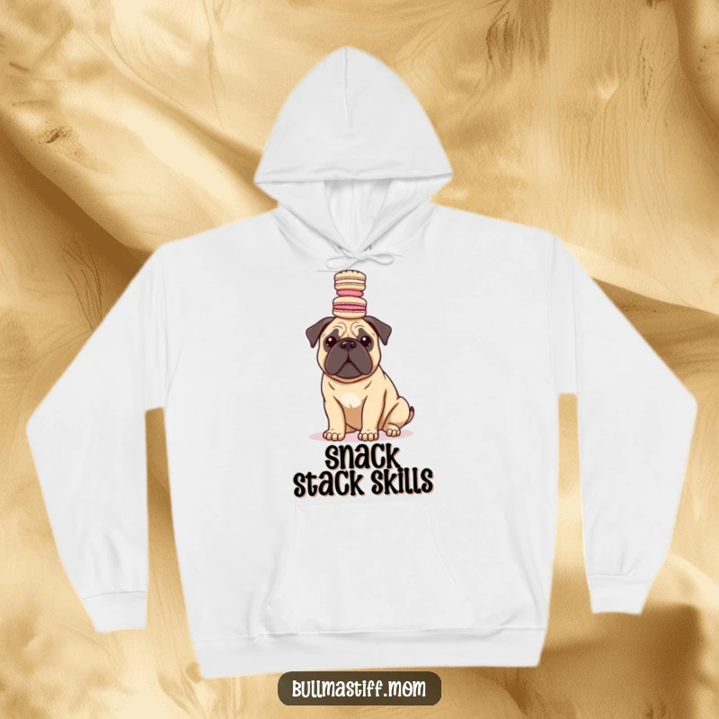 Funny Bullmastiff dog wearing a tiny party hat, balancing macarons on its head, on a comfy hoodie.
