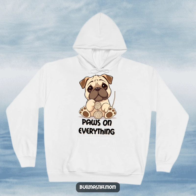 Funny Bullmastiff hoodie depicting a giant-pawed dog adorably and comically batting at a dangling ball of yarn.