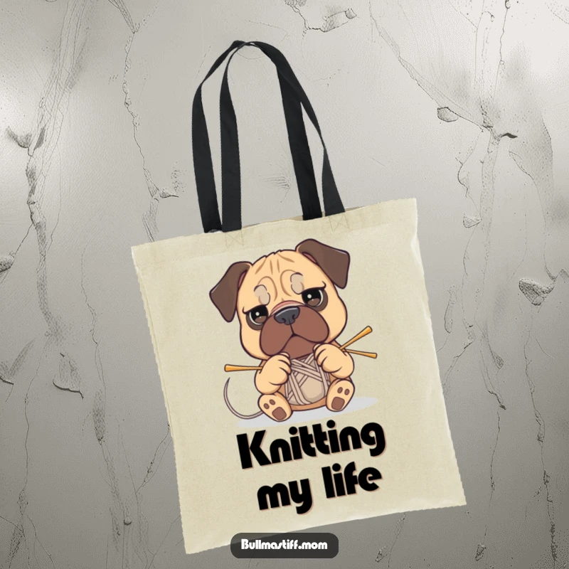 Funny Bullmastiff tote bag featuring a dog with a determined expression attempting to knit with needles and yarn.